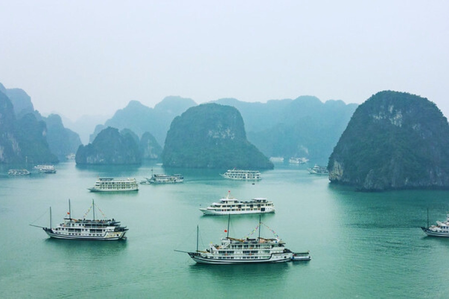 Panoramic view of Halong Bay cruises among limestone karsts with Auasia Travel